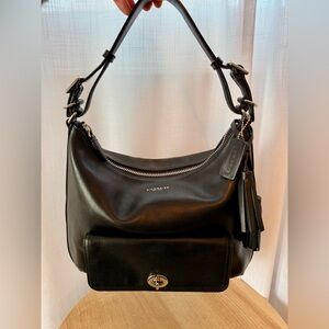 Coach Black Leather Shoulder Bag with Tassels and Silver Accents